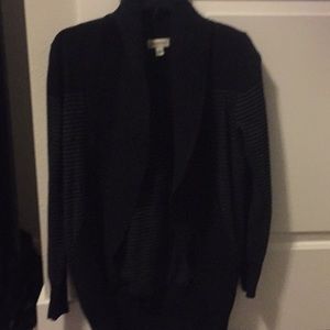 Black sweater with gray stripes.